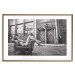 Wall Poster Casual Pose - black and white landscape of a woman in a chair with a building in the background 134181 additionalThumb 14