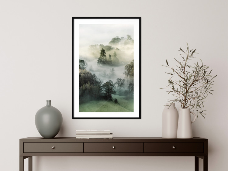 Poster Morning Chill - landscape of trees surrounded by dense fog against the sky 130291 additionalImage 16