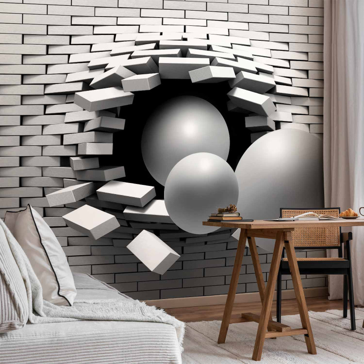 Photo Wallpaper Hole in the Wall - Broken white brick wall with a hole and gray spheres 61791 additionalImage 4