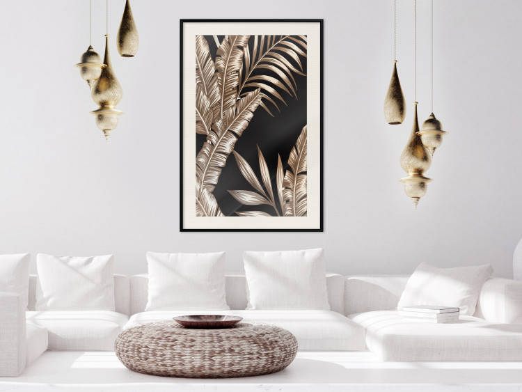 Poster Golden Island - composition of tropical plant leaves on a black background 131802 additionalImage 24