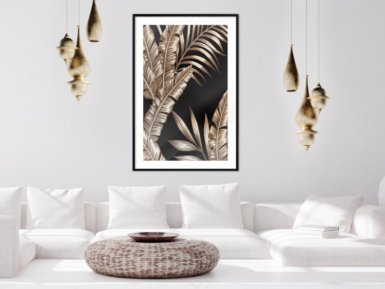Poster Golden Island - composition of tropical plant leaves on a black background 131802 additionalImage 23