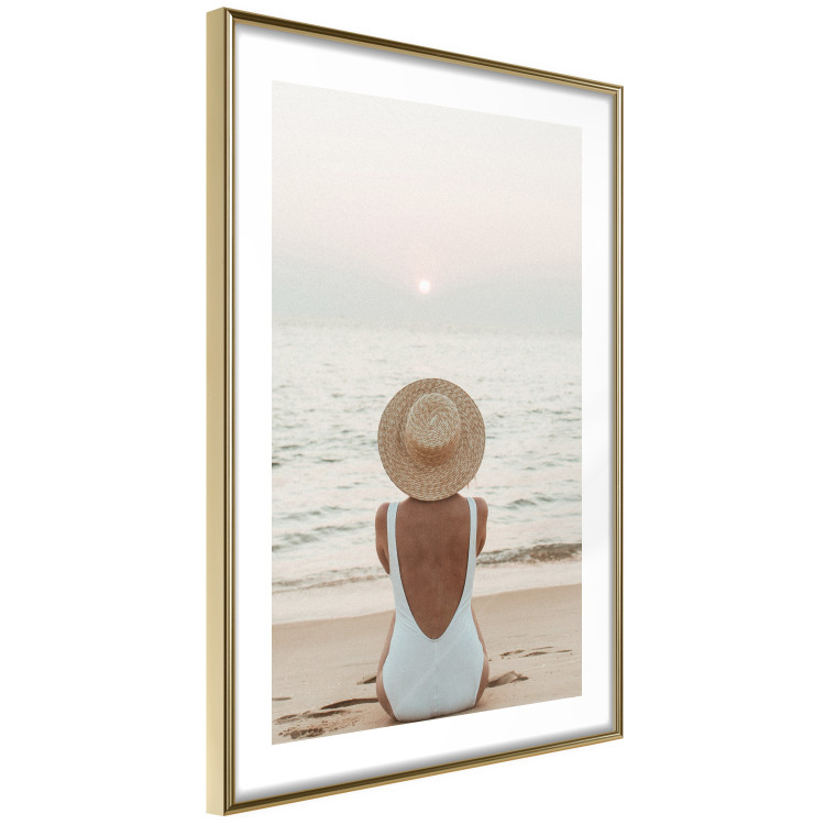 Wall Poster Beach Rest - woman sitting on the sand with sunset in the background 135902 additionalImage 2