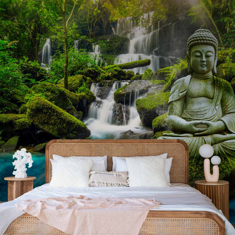 Photo Wallpaper Orient - sculpture of Buddha on the background of a waterfall in highly saturated colours 90012 additionalImage 2