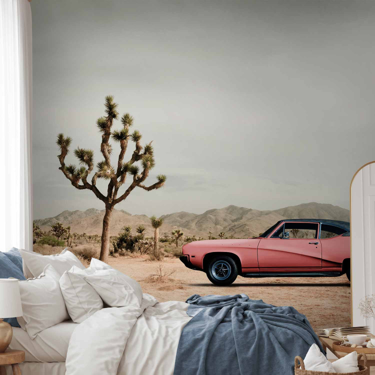 Wall Mural Pink, American classic - photo of desert with car and mountains 136322 additionalImage 2