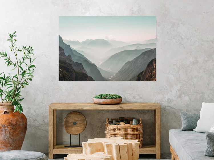 Poster Mountain Horizon - landscape of rocky mountains with a gentle misty glow 129842 additionalImage 2