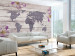 Photo Wallpaper World of flowers - brick map of the world on a background of white boards with inscriptions 63952