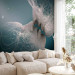 Wall Mural Love - an abstraction with a couple joined in a kiss on a blue background 128762