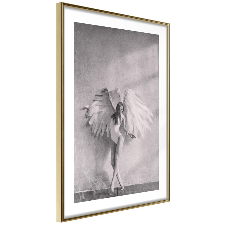 Wall Poster Winged - black and white woman with large wings against a concrete background 134182 additionalImage 9