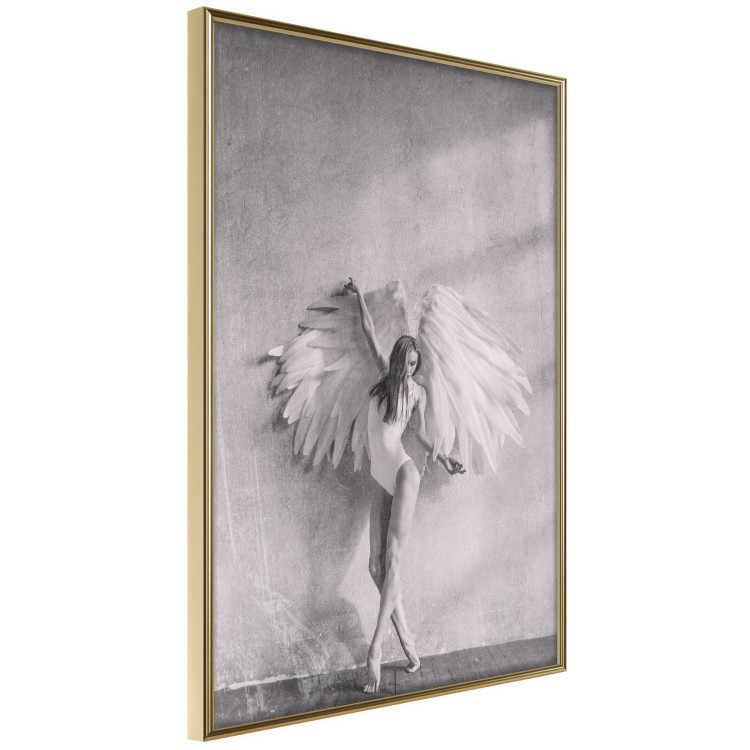 Wall Poster Winged - black and white woman with large wings against a concrete background 134182 additionalImage 12