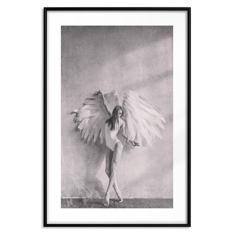 Wall Poster Winged - black and white woman with large wings against a concrete background 134182 additionalImage 18