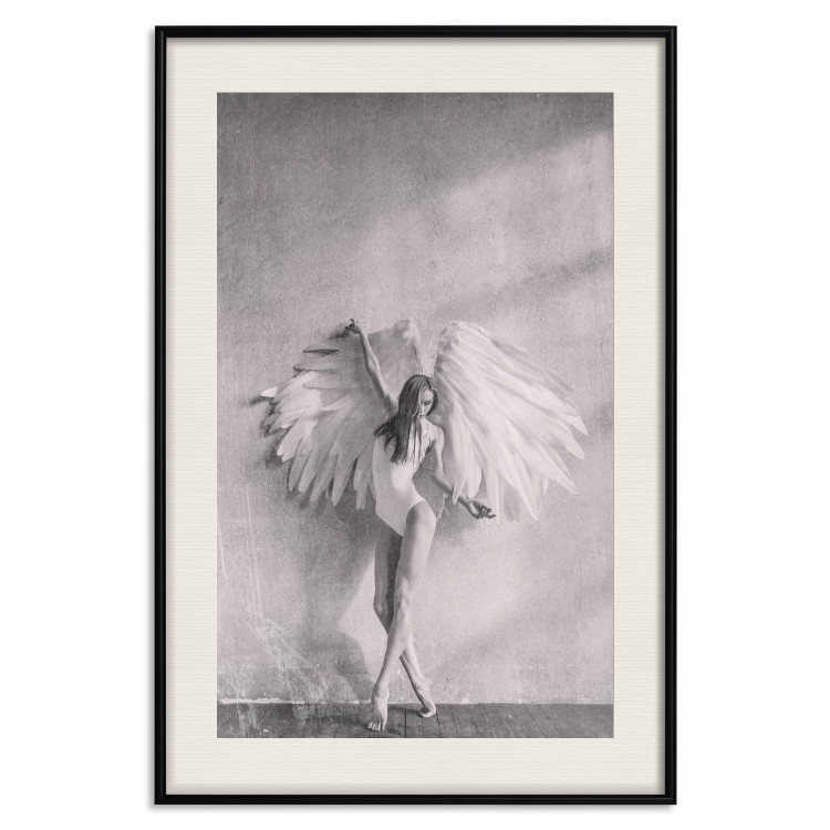 Wall Poster Winged - black and white woman with large wings against a concrete background 134182 additionalImage 19