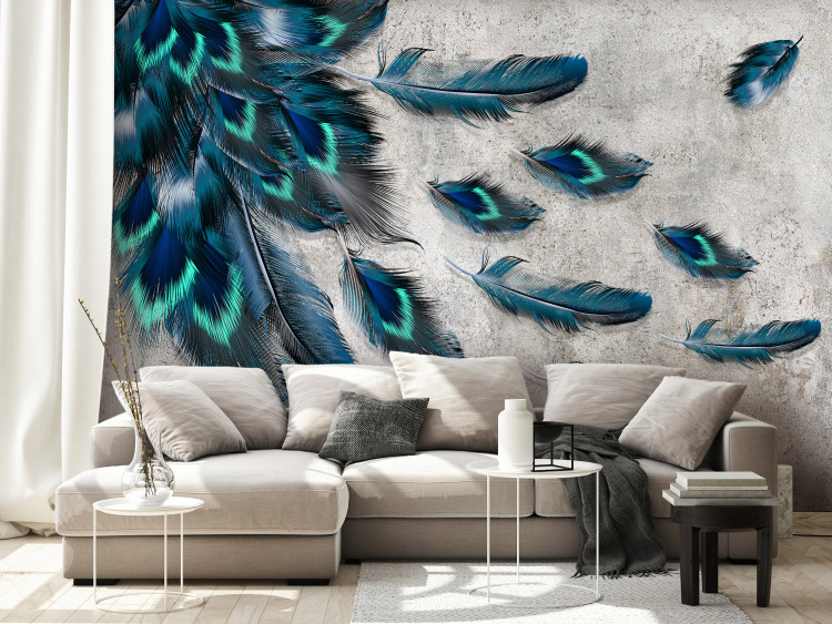 Photo Wallpaper In the wind - blown blue feathers on a concrete textured background 136313