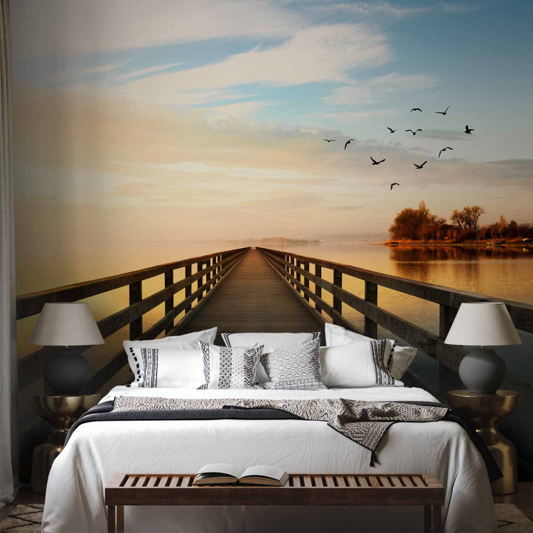 Wall Mural Landscape - a bridge over a calm lake surrounded by birds and trees 91613 additionalImage 2