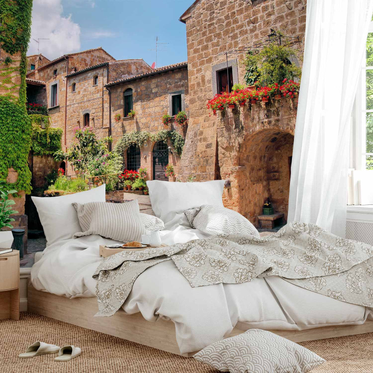Wall Mural Street in Tuscany - Italian town with brick houses and flowers 97323 additionalImage 2