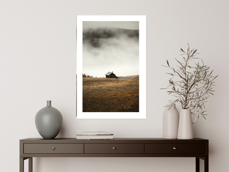 Poster Mountain Retreat - field landscape with a small cottage against white clouds 131783 additionalImage 3