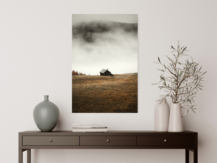 Poster Mountain Retreat - field landscape with a small cottage against white clouds 131783 additionalImage 2