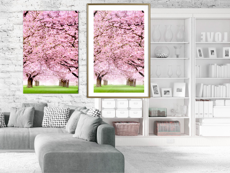 Poster Cherry Orchard - landscape of green grass and trees with pink leaves 126214 additionalImage 15