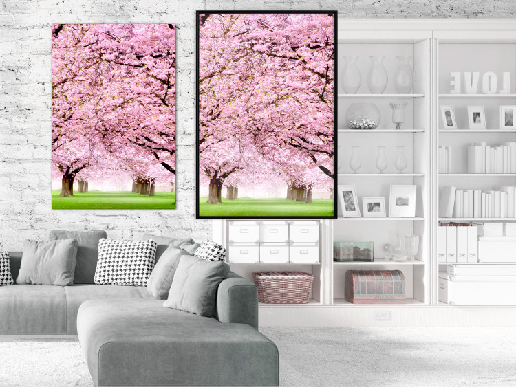 Poster Cherry Orchard - landscape of green grass and trees with pink leaves 126214 additionalImage 5