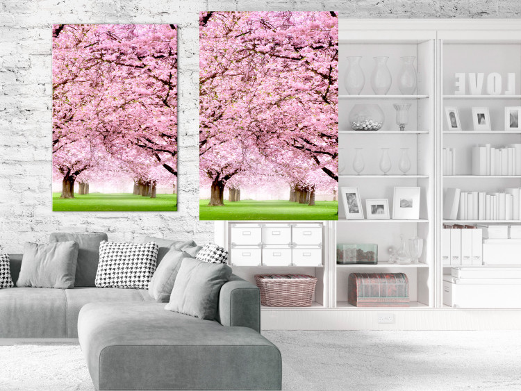 Poster Cherry Orchard - landscape of green grass and trees with pink leaves 126214 additionalImage 16
