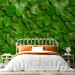 Wall Mural Breath of nature - uniform background in a pattern of stacked green tree leaves 64414 additionalThumb 2