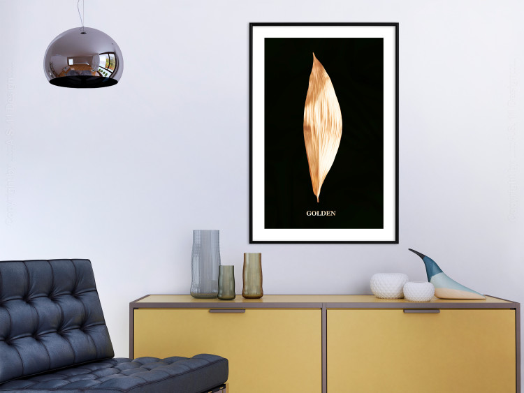 Poster Modest Elegance - plant composition of a golden leaf on a black background 130524 additionalImage 23