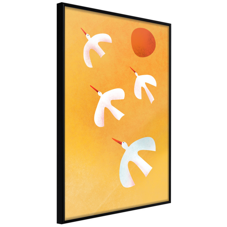 Wall Poster Stork Games - four white flying animals against a yellow sky 135724 additionalImage 23