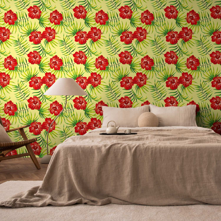 Wallpaper Fiery Hibiscus - Red Flowers and Green Leaves on a Yellow Background 150034