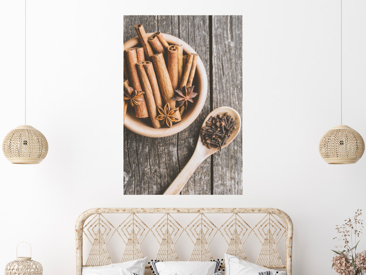 Poster Spice Scent - winter cinnamon spice lying on a wooden table 124454 additionalImage 23