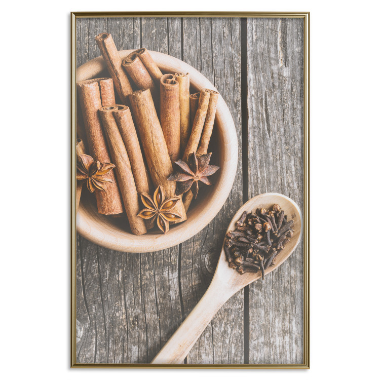 Poster Spice Scent - winter cinnamon spice lying on a wooden table 124454 additionalImage 20