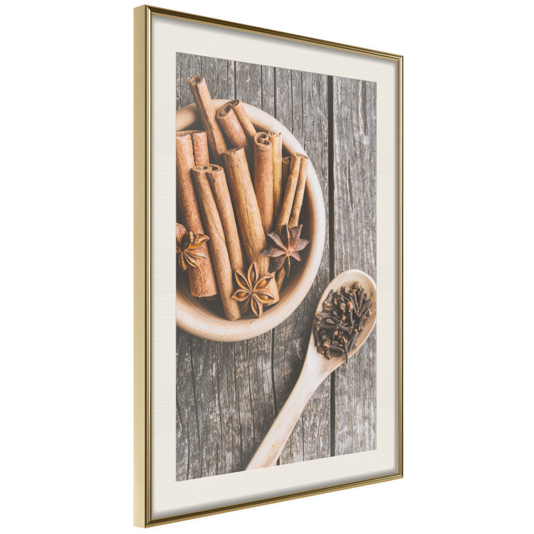 Poster Spice Scent - winter cinnamon spice lying on a wooden table 124454 additionalImage 2