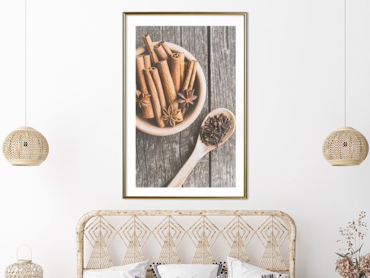 Poster Spice Scent - winter cinnamon spice lying on a wooden table 124454 additionalImage 15