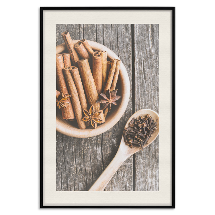 Poster Spice Scent - winter cinnamon spice lying on a wooden table 124454 additionalImage 18