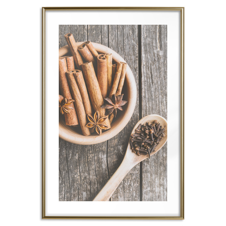 Poster Spice Scent - winter cinnamon spice lying on a wooden table 124454 additionalImage 16