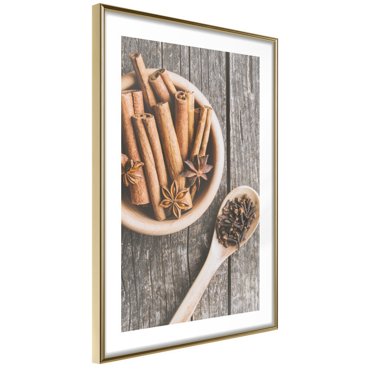 Poster Spice Scent - winter cinnamon spice lying on a wooden table 124454 additionalImage 8