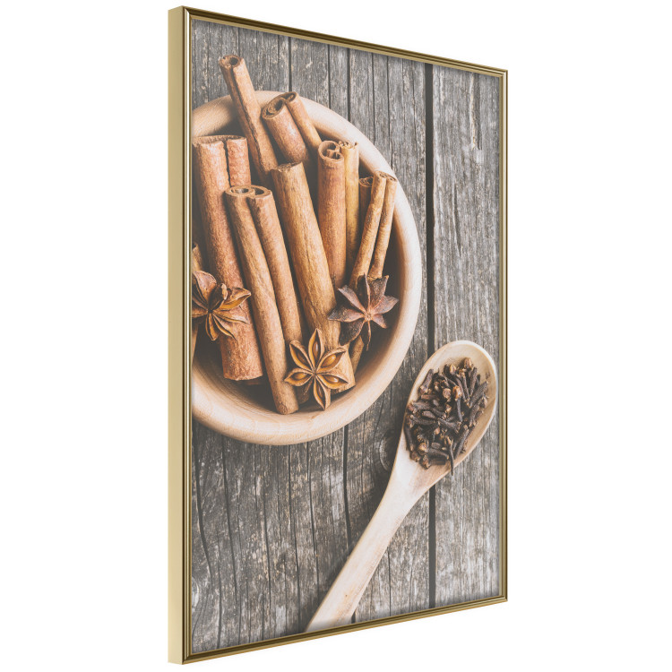 Poster Spice Scent - winter cinnamon spice lying on a wooden table 124454 additionalImage 14