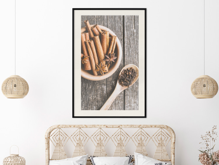Poster Spice Scent - winter cinnamon spice lying on a wooden table 124454 additionalImage 22