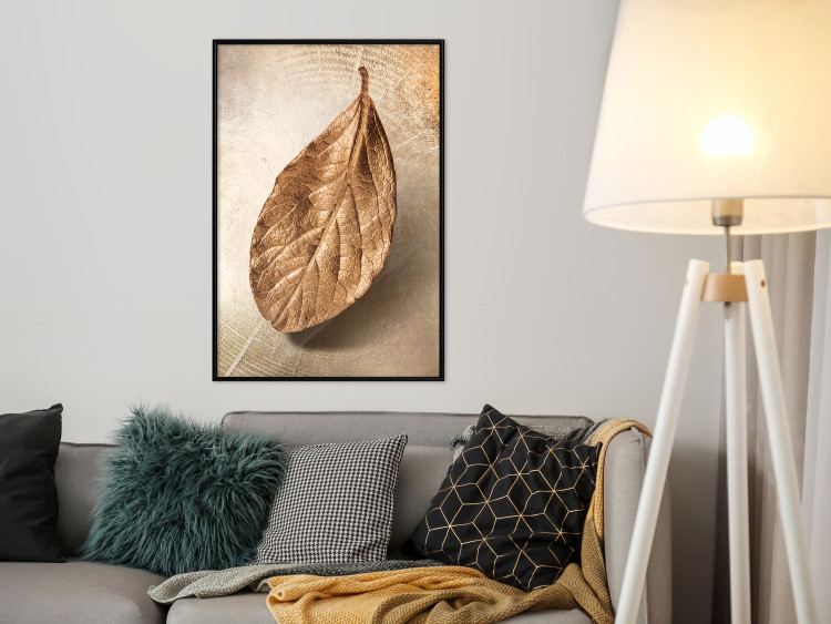 Poster Golden Lightness - golden leaf with distinct texture on a beige background 127394 additionalImage 4