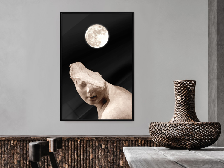 Poster Moon and Statue - whimsical sculpture without half of the head on a black background 129725 additionalImage 6