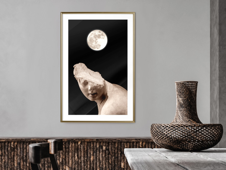 Poster Moon and Statue - whimsical sculpture without half of the head on a black background 129725 additionalImage 15