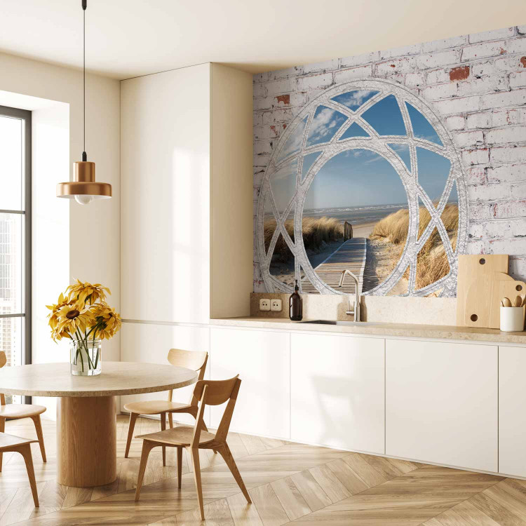 Wall Mural Window to the sea - view from a window among white bricks on a sandy beach 97325 additionalImage 7