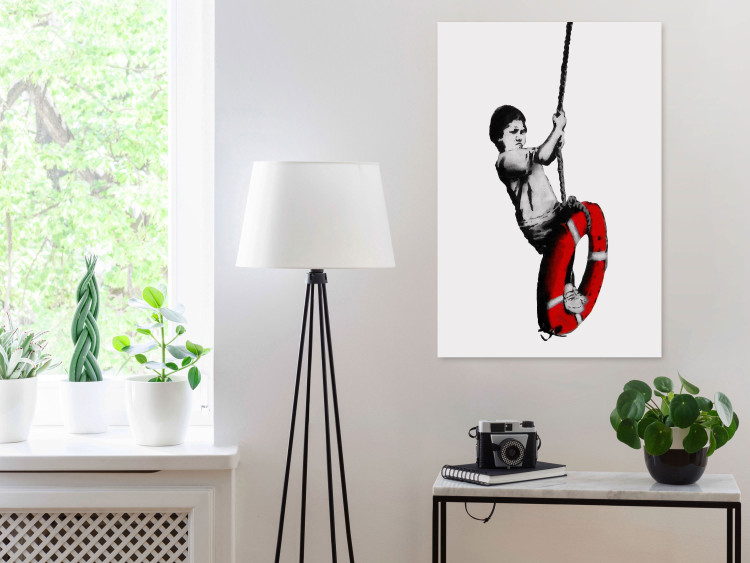Canvas Art Print Boy with a lifebuoy - black and white graphic in street art style 132435 additionalImage 3