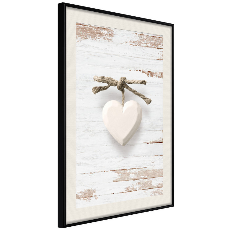 Poster Knotted Love - stone white heart on light wooden background 128055 additionalImage 2