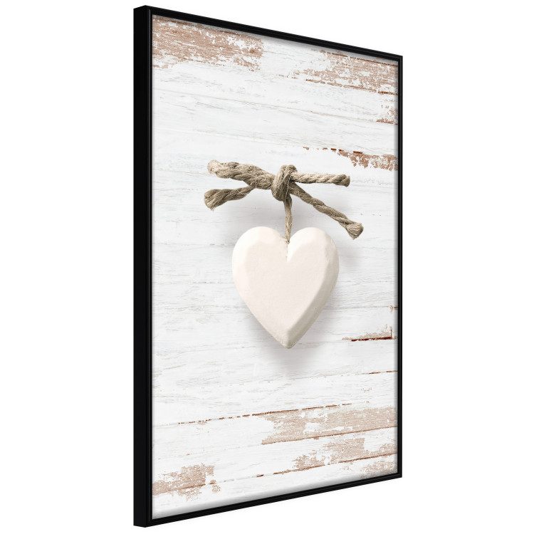 Poster Knotted Love - stone white heart on light wooden background 128055 additionalImage 13
