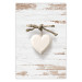 Poster Knotted Love - stone white heart on light wooden background 128055