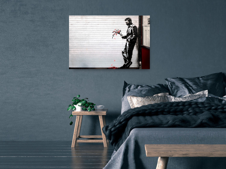 Wall Poster In Love - man with flowers against a white gate in Banksy style 132465 additionalImage 19