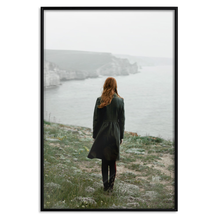 Poster What Now? - landscape of a woman dressed in green against the sea and rocks 130295 additionalImage 20