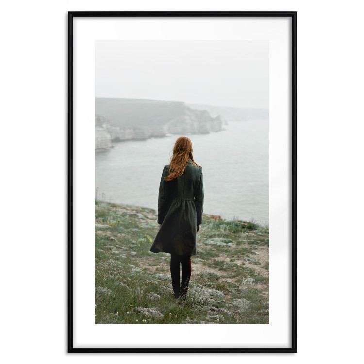 Poster What Now? - landscape of a woman dressed in green against the sea and rocks 130295 additionalImage 16