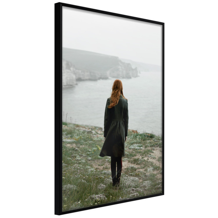 Poster What Now? - landscape of a woman dressed in green against the sea and rocks 130295 additionalImage 11