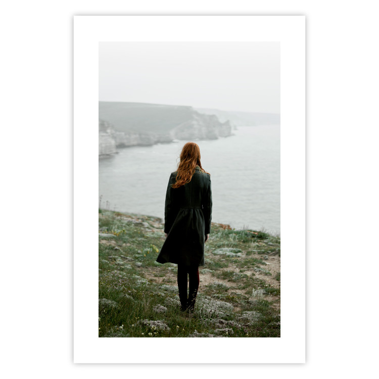 Poster What Now? - landscape of a woman dressed in green against the sea and rocks 130295 additionalImage 18