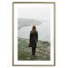Poster What Now? - landscape of a woman dressed in green against the sea and rocks 130295 additionalThumb 17
